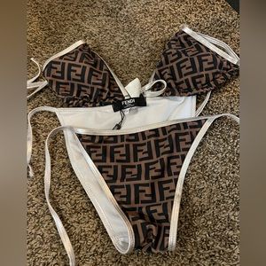 NEVER WORN FENDI SWIM SUIT.